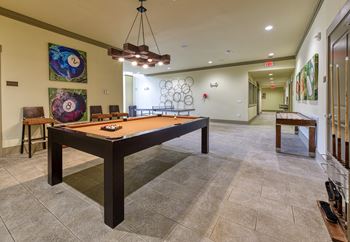Clubhouse with billiards, ping pong, and shuffle board at 4700 colonnade apartments in birmingham, al
